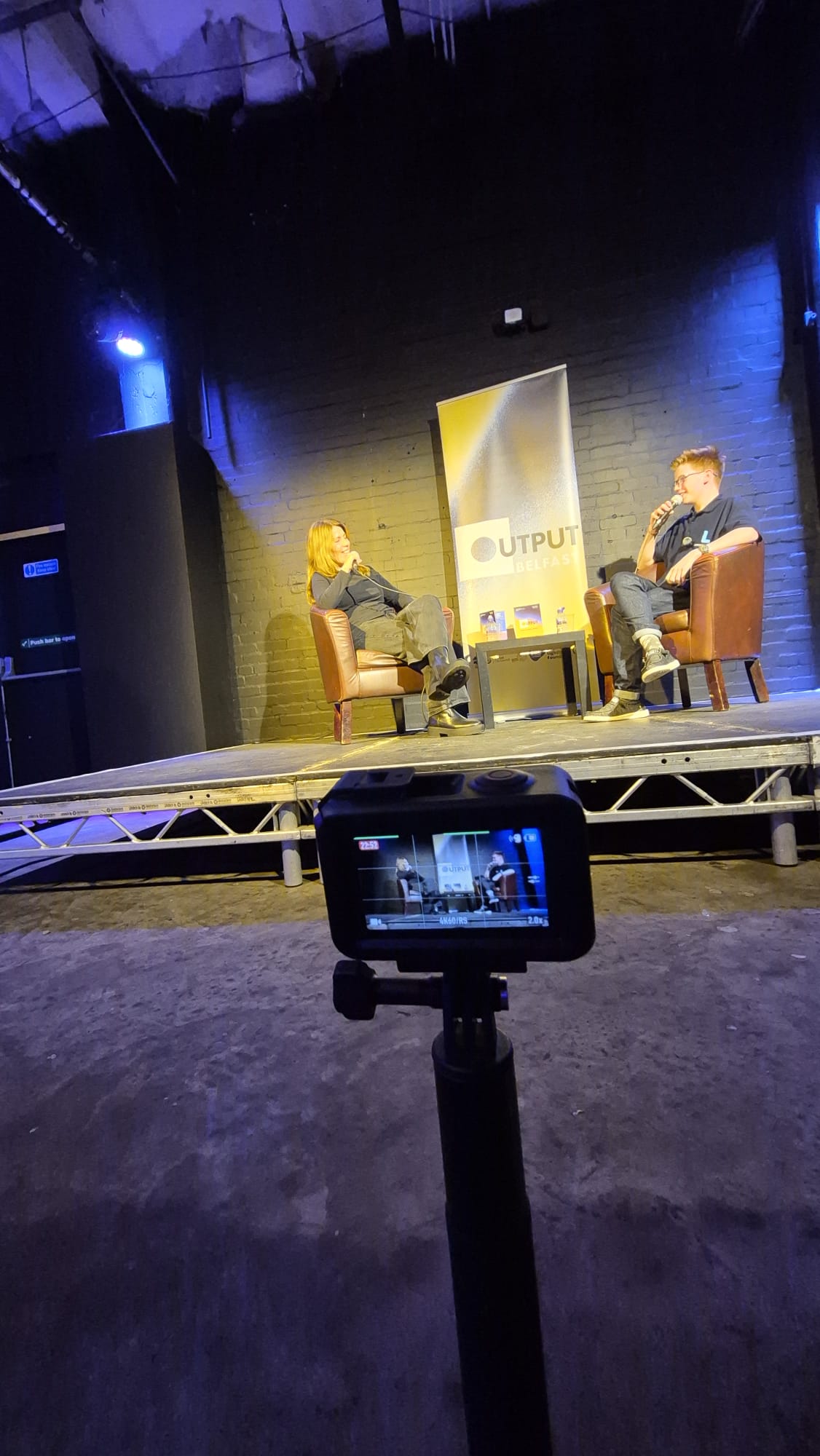 Logan interviewing Niamh Regan at Output Belfast 2025