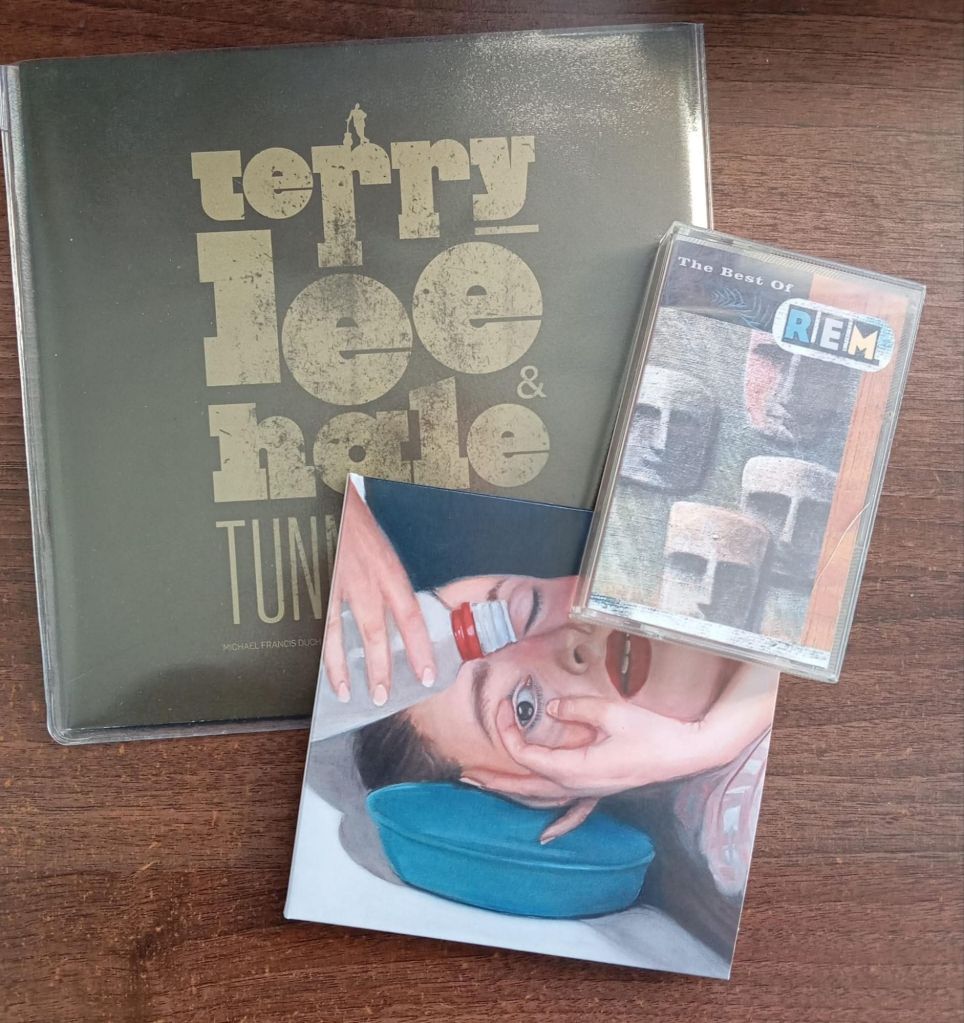 Logan does 60 Second Reviews of CD's, Cassettes and Singles from his own collection